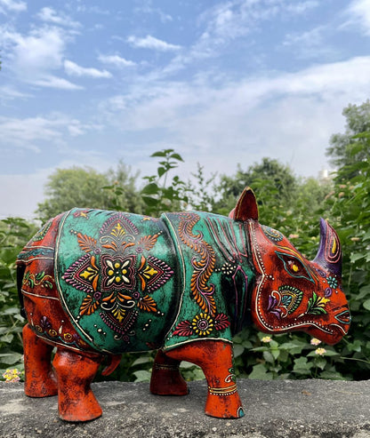 WOODEN PAINTED RHINOCEROS FIGURINE