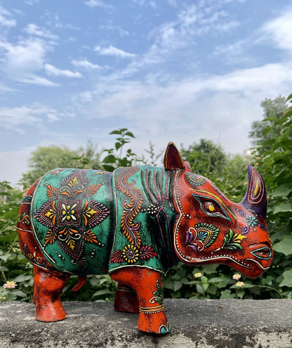 WOODEN PAINTED RHINOCEROS FIGURINE