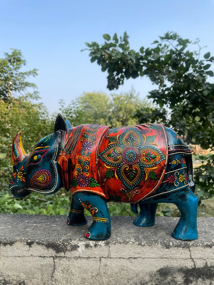 WOODEN PAINTED RHINOCEROS FIGURINE