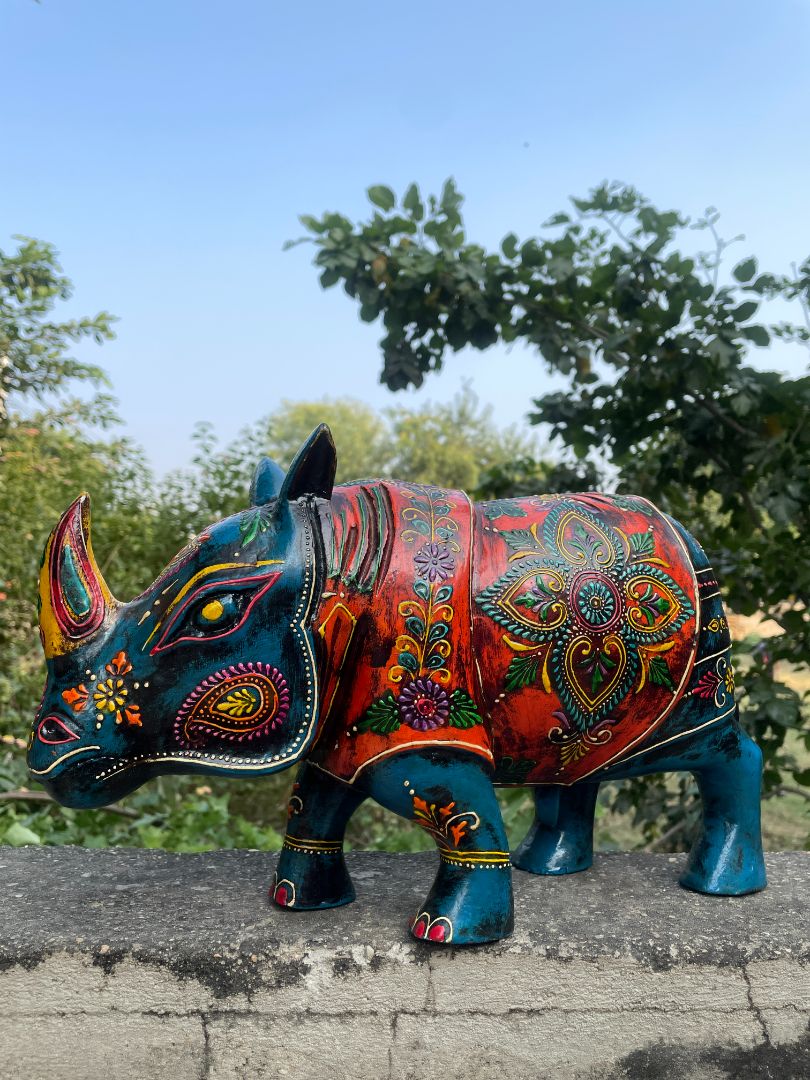 WOODEN PAINTED RHINOCEROS FIGURINE