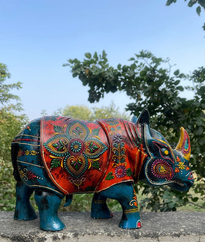 WOODEN PAINTED RHINOCEROS FIGURINE