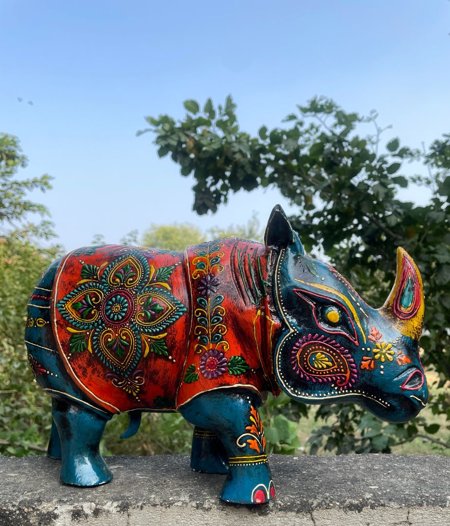 WOODEN PAINTED RHINOCEROS FIGURINE